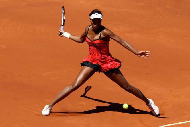 Williams lit up the clay at a WTA event in Madrid in 2010 with this risque red and black dress.