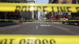 A section of Fifth Avenue sits closed by police outside the Empire State Building after it re-opened to the public after a shooting outside the building August 24, 2012 in New York City. 