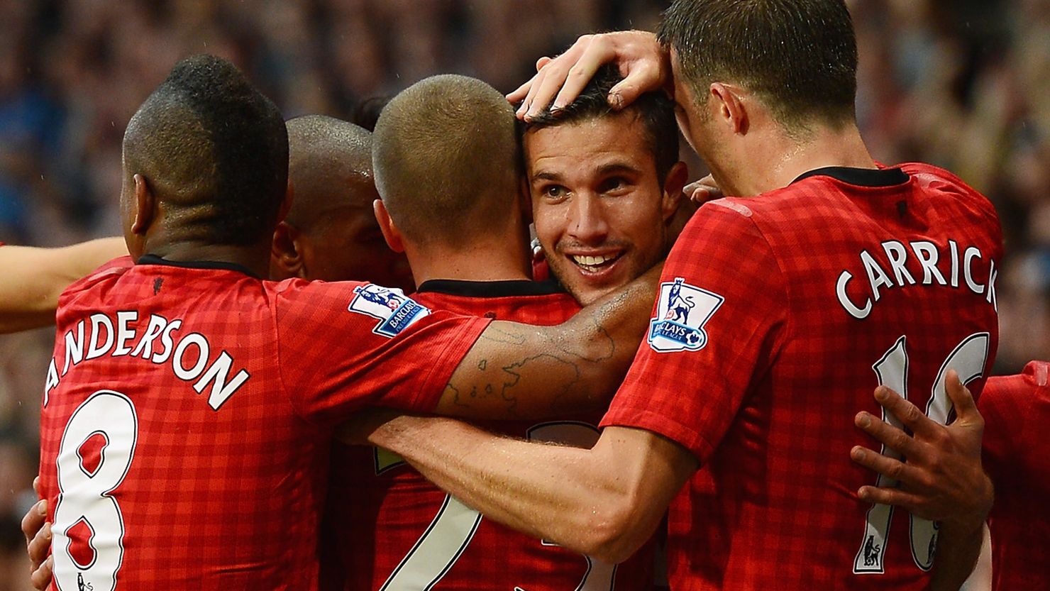 Robin van Persie celebrates his first goal for Manchester United