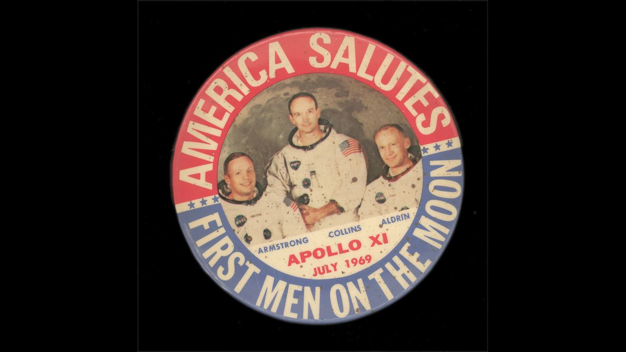 A commemorative button from 1969 celebrates the moon landing.
