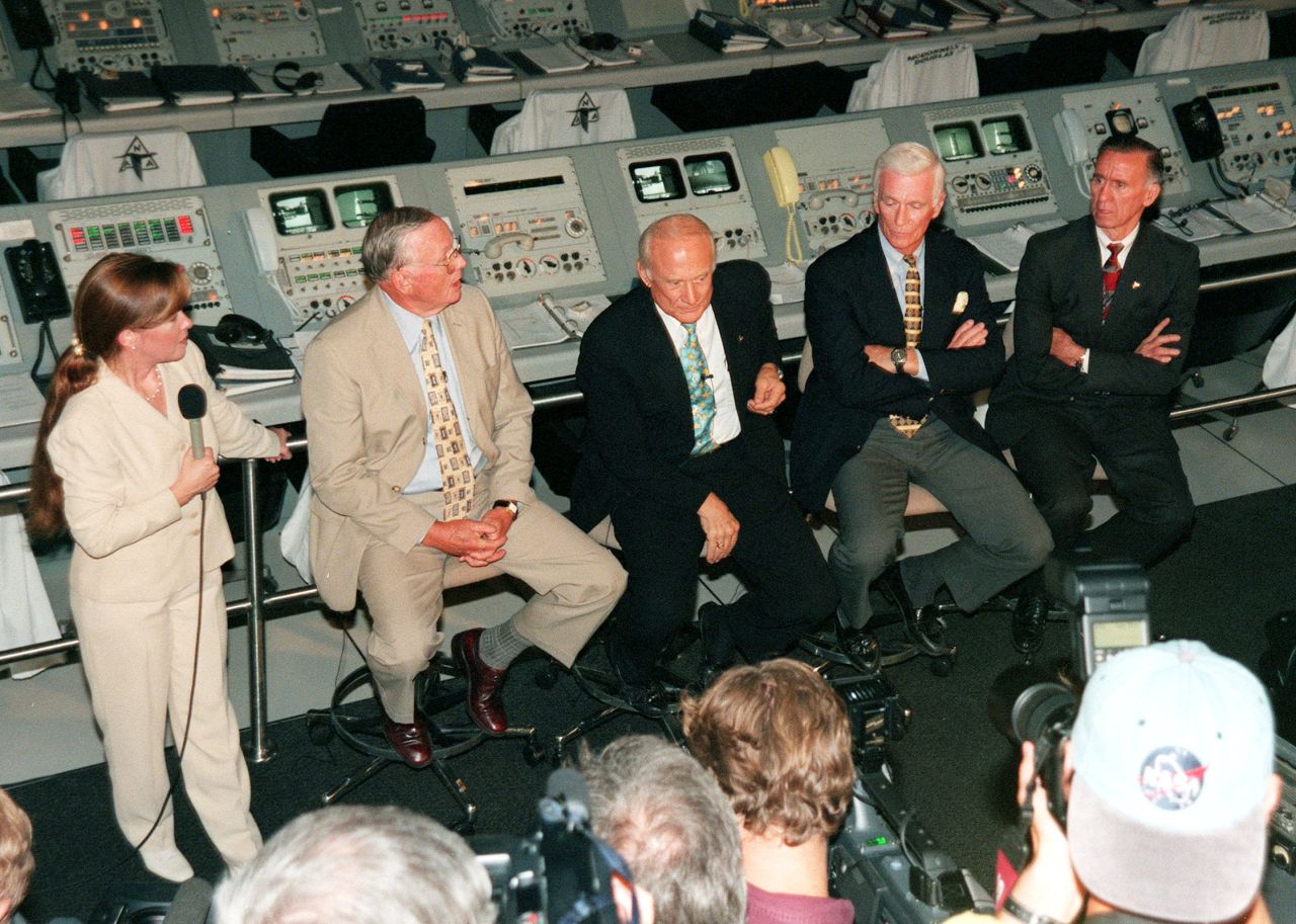 Former Apollo astronauts meet with the media at the Apollo/Saturn V Center prior to a 30th anniversary banquet highlighting the contributions of aerospace employees who made the Apollo program possible on July 16, 1999. From left to right: Armstrong; Aldrin; Gene Cernan, who flew on Apollo10 and Apollo 17; and Walt Cunningham, who flew on Apollo 7. 
