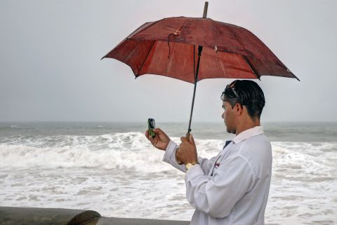 A man captures the effects of Tropical Storm Isaac in Gibara.