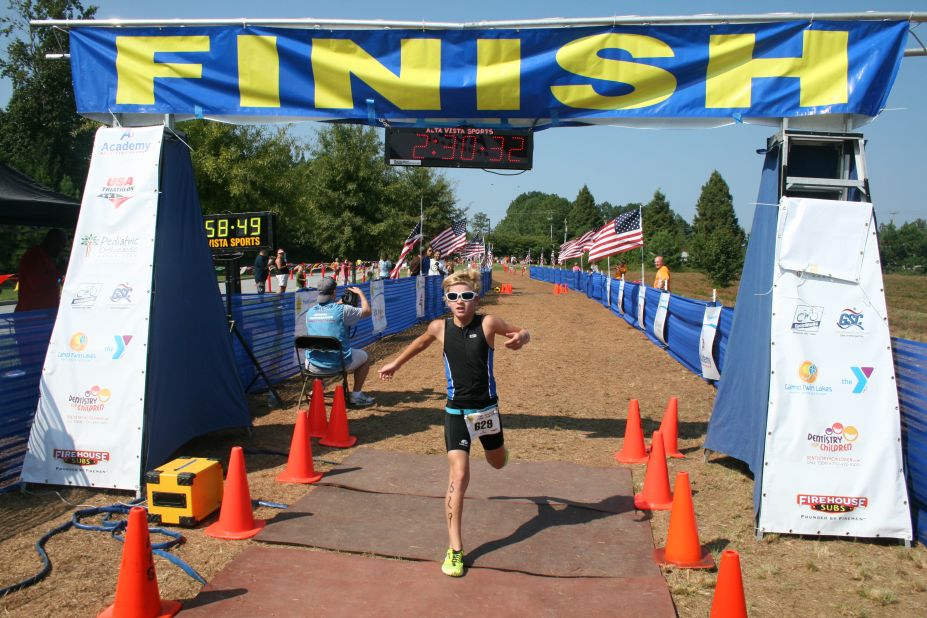 Kennan Milford, 10, crosses the finish line ahead of the rest of his group. 