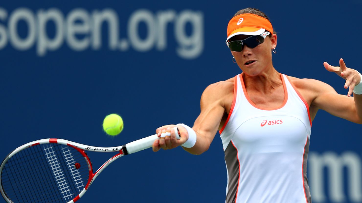 Samantha Stosur of Australia returns serve to Petra Martic from Croatia during her easy first round U.S. Open victory.
