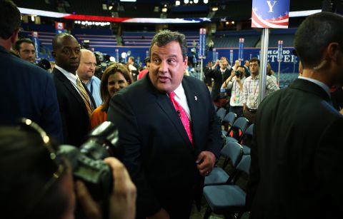 New Jersey Gov. Chris Christie walks through the convention center before the start of the abbreviated first day.