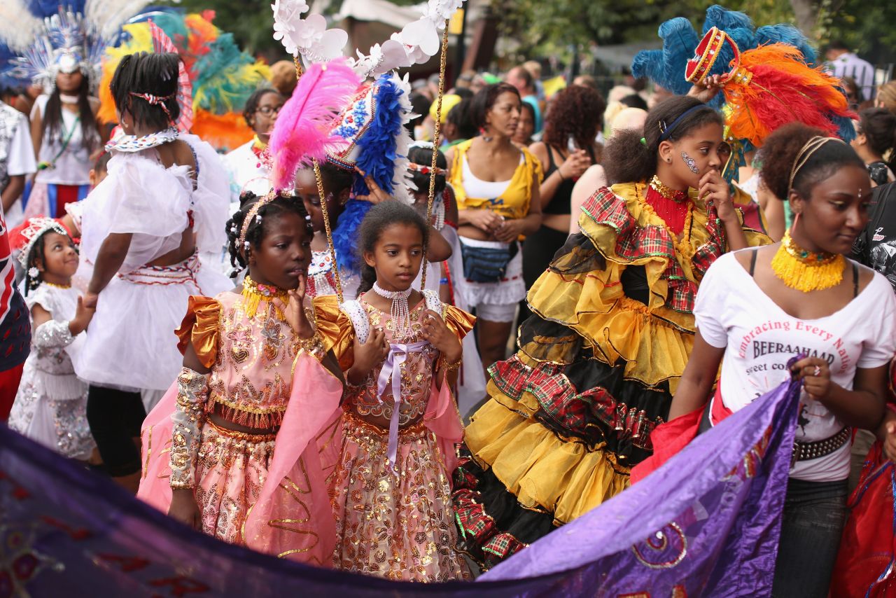 Young girls prepare to perform on Sunday.
