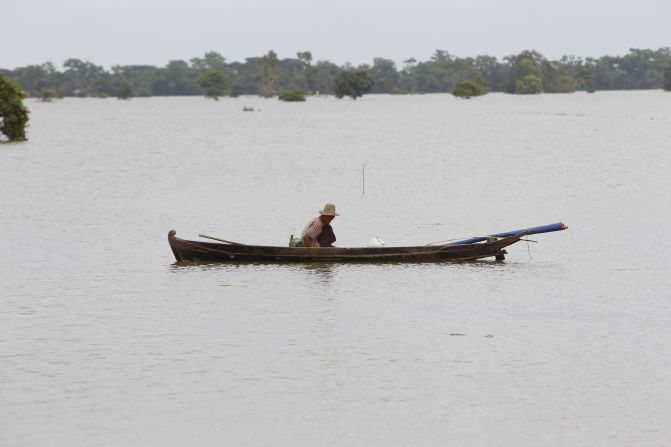 In areas badly affected by flooding, long boats have become the main form of transport