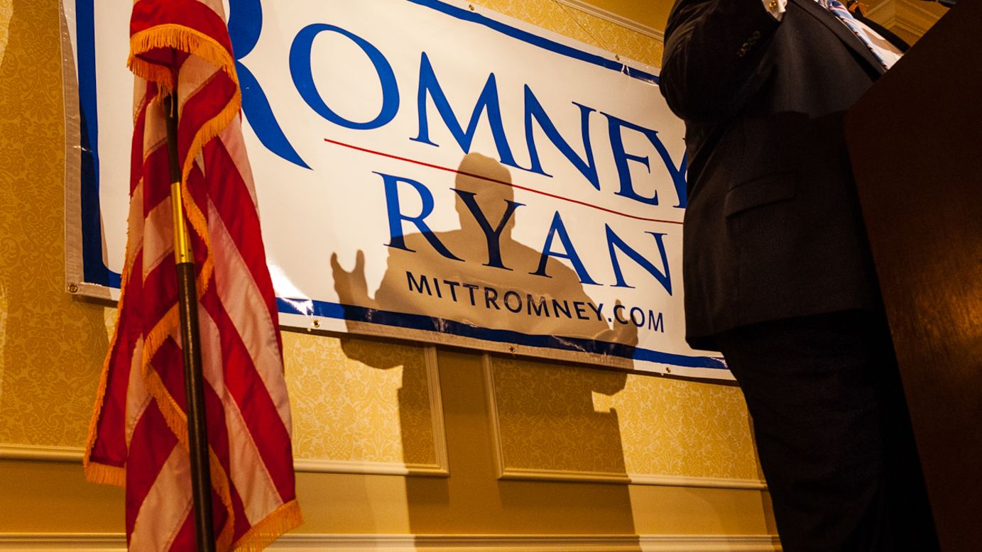New Jersey Gov. Chris Christie casts a shadow on a Romney/Ryan campaign sign while speaking to delegates from Michigan. Christie will deliver the convention's keynote address Tuesday night.