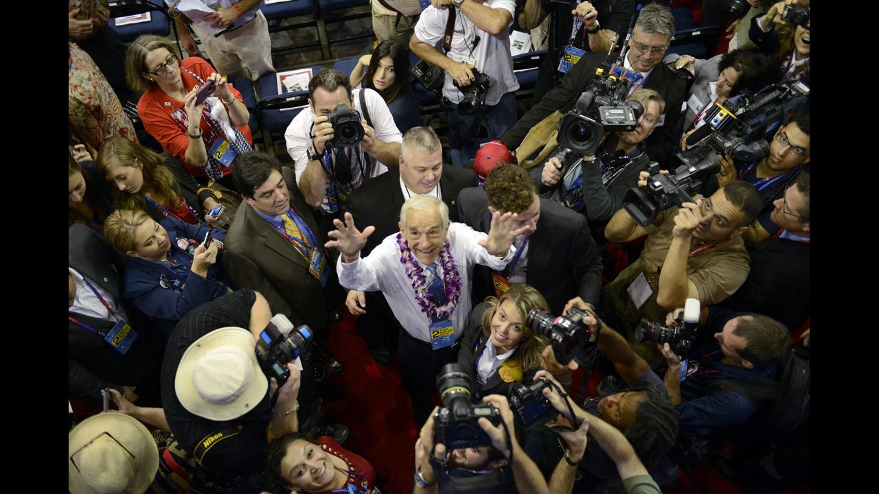 Republican candidate Ron Paul waves to supporters at the Tampa Bay Times Forum.