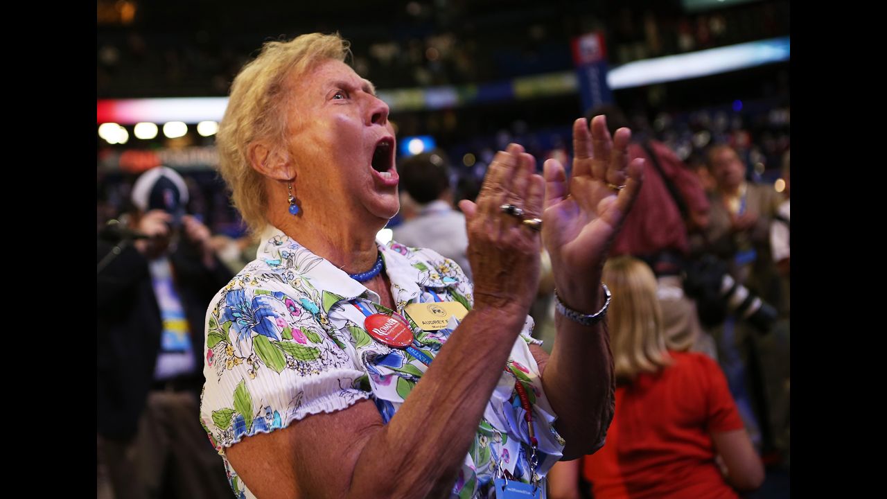 A woman cheers during the second day of the Republican National Convention.