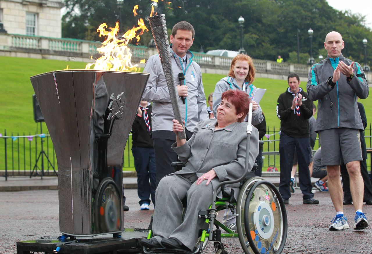 Paralympian athlete Angela Hendra prepares to light the cauldron during the London 2012 Paralympic Games lighting ceremony at Stormont Government buildings in Belfast, Northern Ireland on August 25.