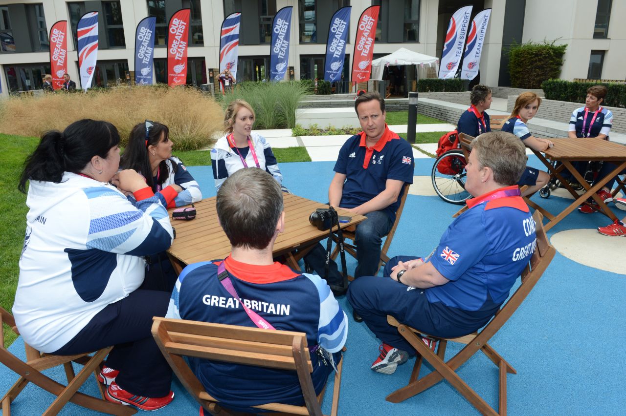 Prime Minister David Cameron meets members of the Great Britain Paralympics archery team during a visit to the Olympic village, ahead of the London 2012 Paralympic Games in the Olympic Park, on August 24.