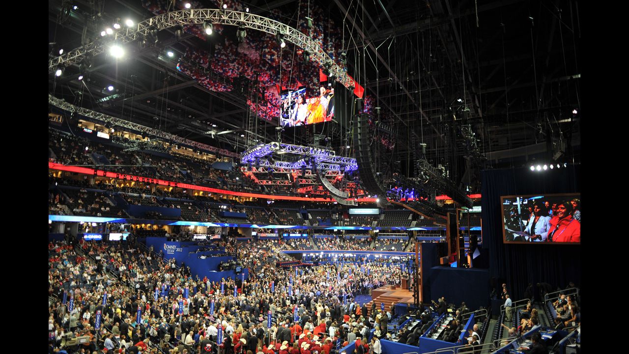 Delegates crowd the floor after the tallying of votes during the roll call for nomination of president of the United States at the Tampa Bay Times Forum.