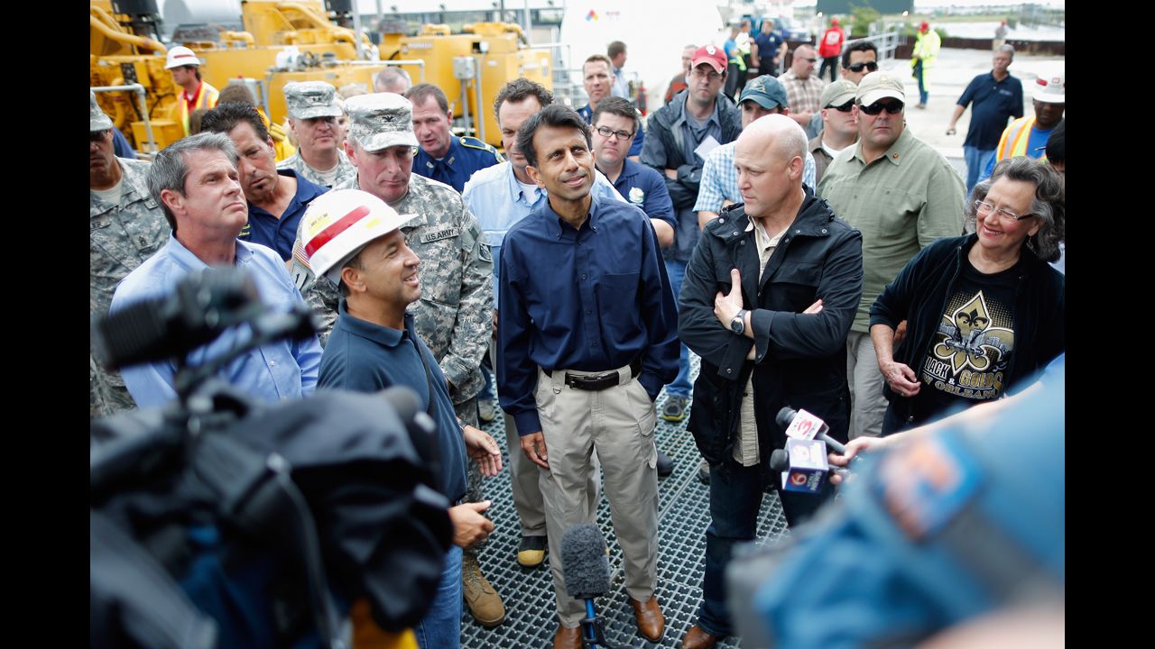Louisiana Gov. Bobby Jindal and New Orleans Mayor Mitch Landrieu receive an update on the status of the pumping station at the 17th Street Canal in Metairie, Louisiana. 