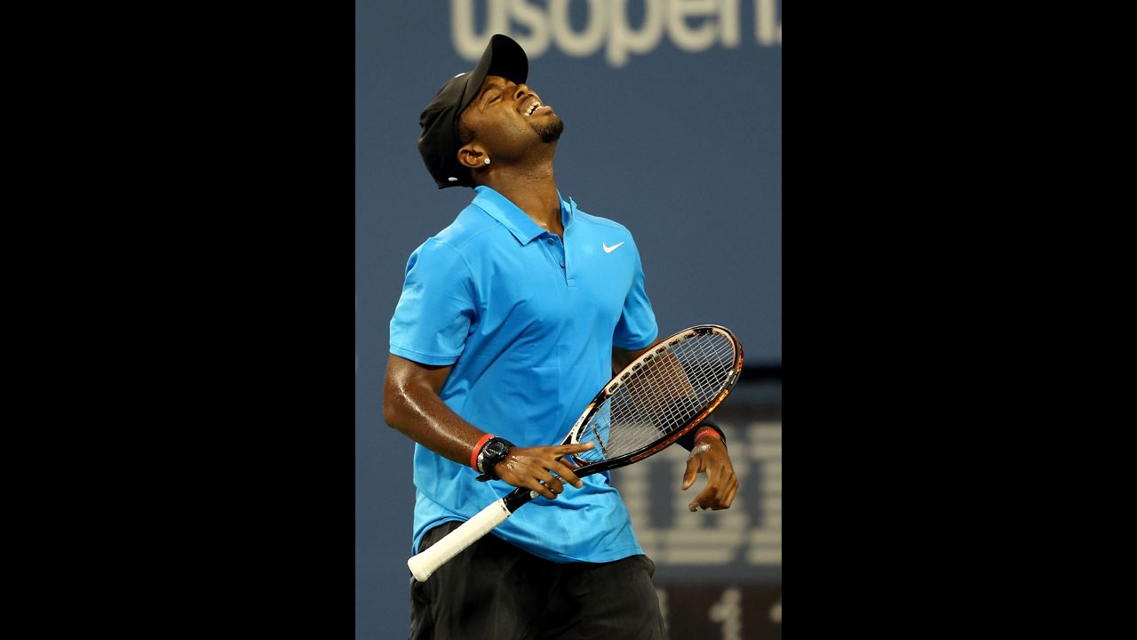 Donald Young reacts during his match against Roger Federer.