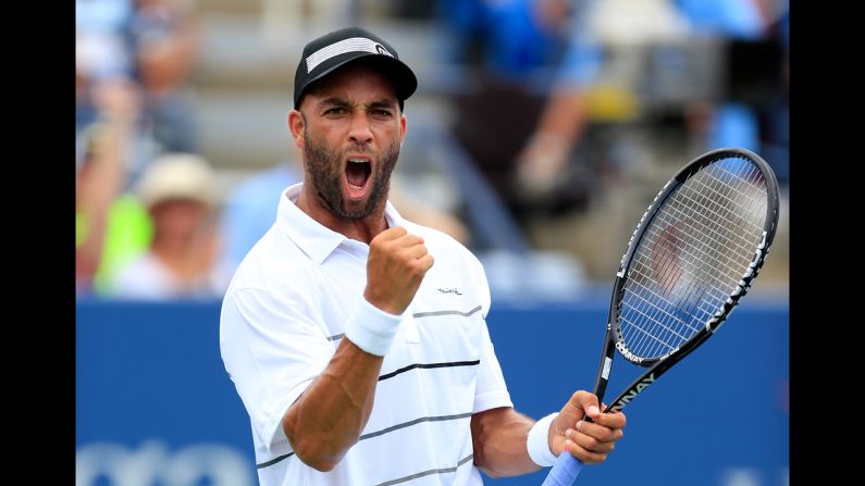 American James Blake celebrates a point during his men's singles first-round match against Lukas Lacko of Slovakia.