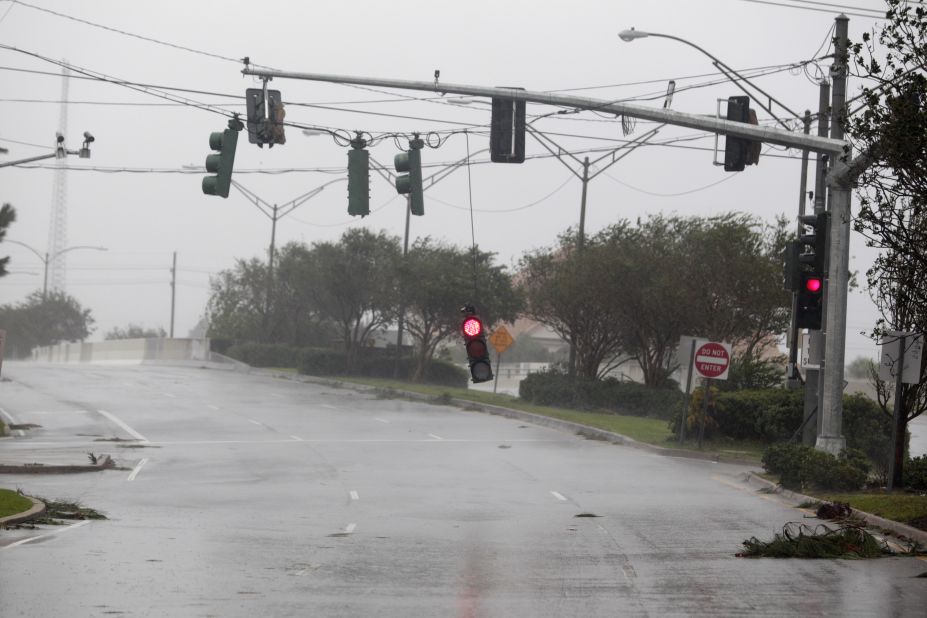 Isaac pounds Gulf CoastA traffic light dangles at an intersection in Metairie, Louisiana, during strong wind and rain as Hurricane Isaac pushes ashore.