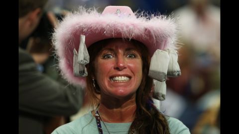 Leslie Jones of Virginia Beach, Virginia, wears a hat with tea bags attached.