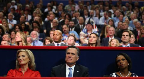Republican presidential candidate Mitt Romney sits between his wife, Ann, and former U.S. Secretary of State Condoleezza Rice during Gov. Chris Christie's speech.