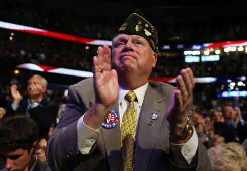A veteran claps during Ann Romney's speech.