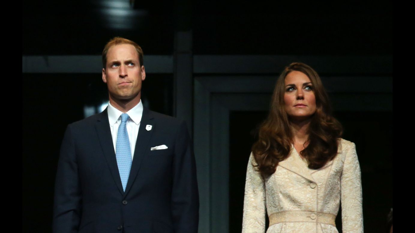 Prince William, Duke of Cambridge, and Catherine, Duchess of Cambridge, watch the ceremony.