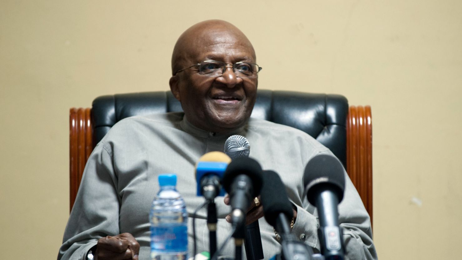 Archbishop Desmond Tutu, pictured here on July 6, 2012, will not attend because he does not want to share a platform with Blair.