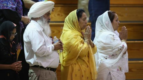 Sikhs gather in prayer.