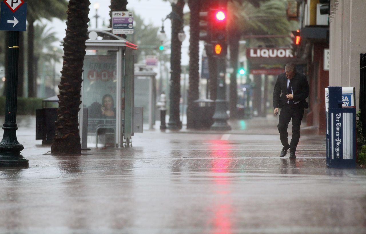  A man walks on Canal Street in New Orleans.