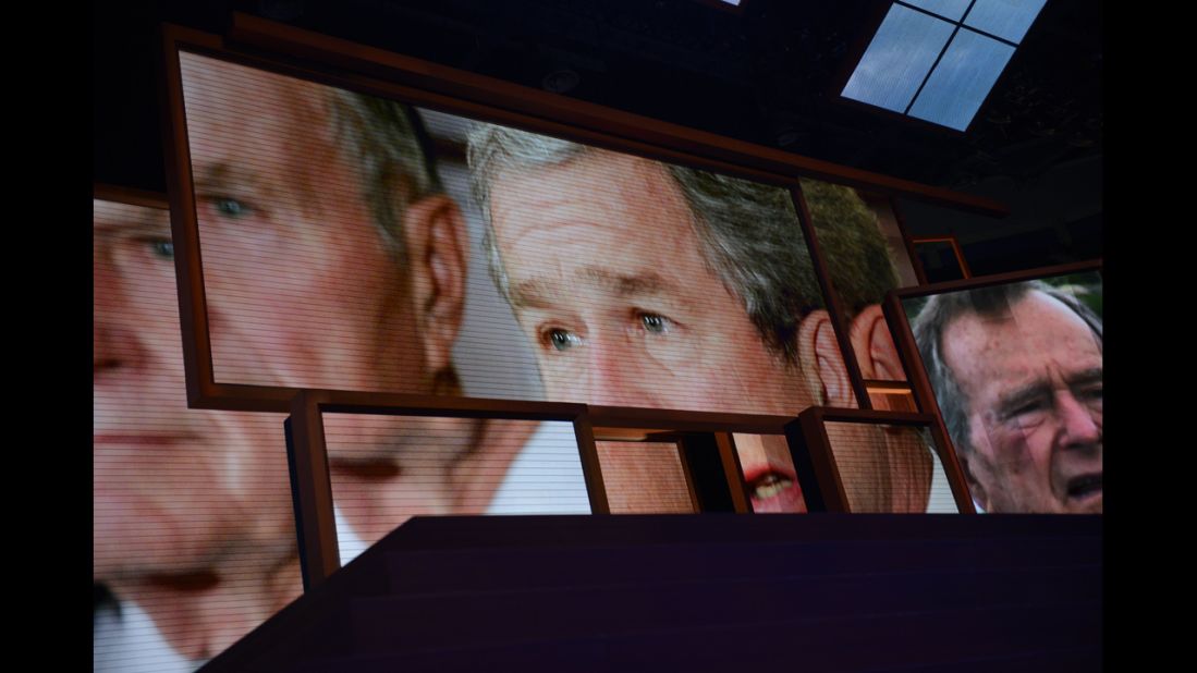 Former President George W. Bush is shown on the giant screens at the Tampa Bay Times Forum.
