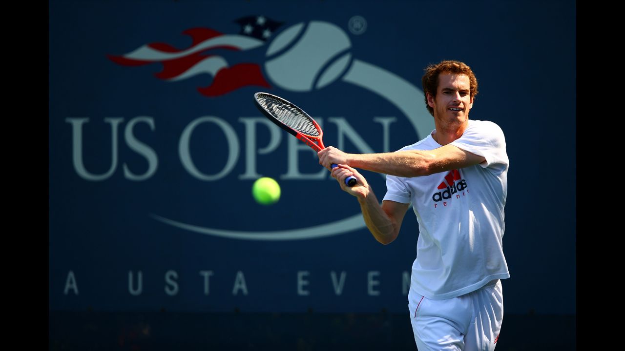 Andy Murray of Great Britain plays a backhand during a practice session.