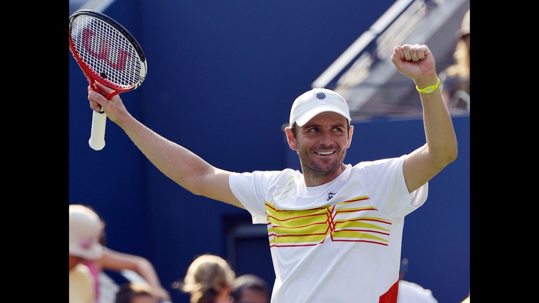Mardy Fish of the United States celebrates after defeating Nikolay Davydenko of Russia.
