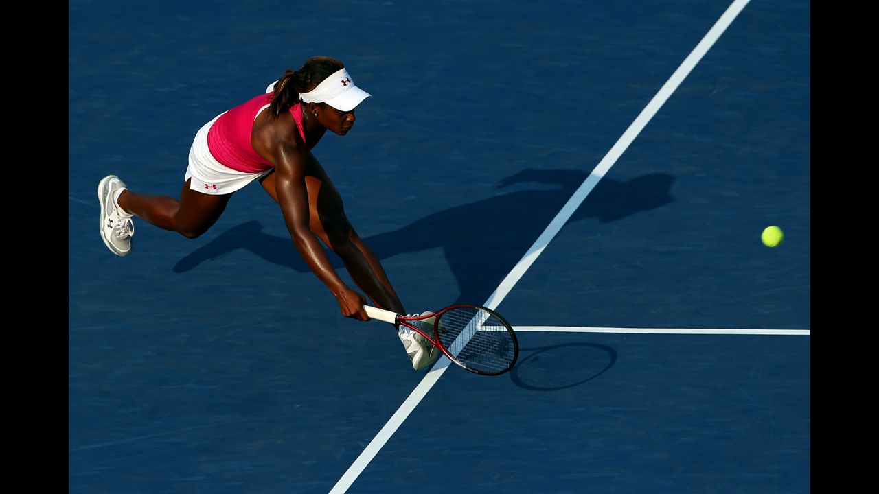 Sloane Stephens of the United States returns a shot during her women's singles second-round match against Tatjana Malek of Germany.