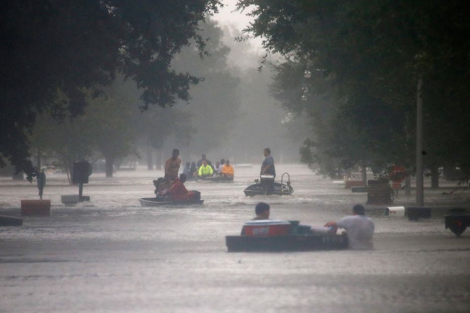 Rescue workers transport residents trapped by rising water from Isaac in Laplace, Louisiana, on Wednesday. 