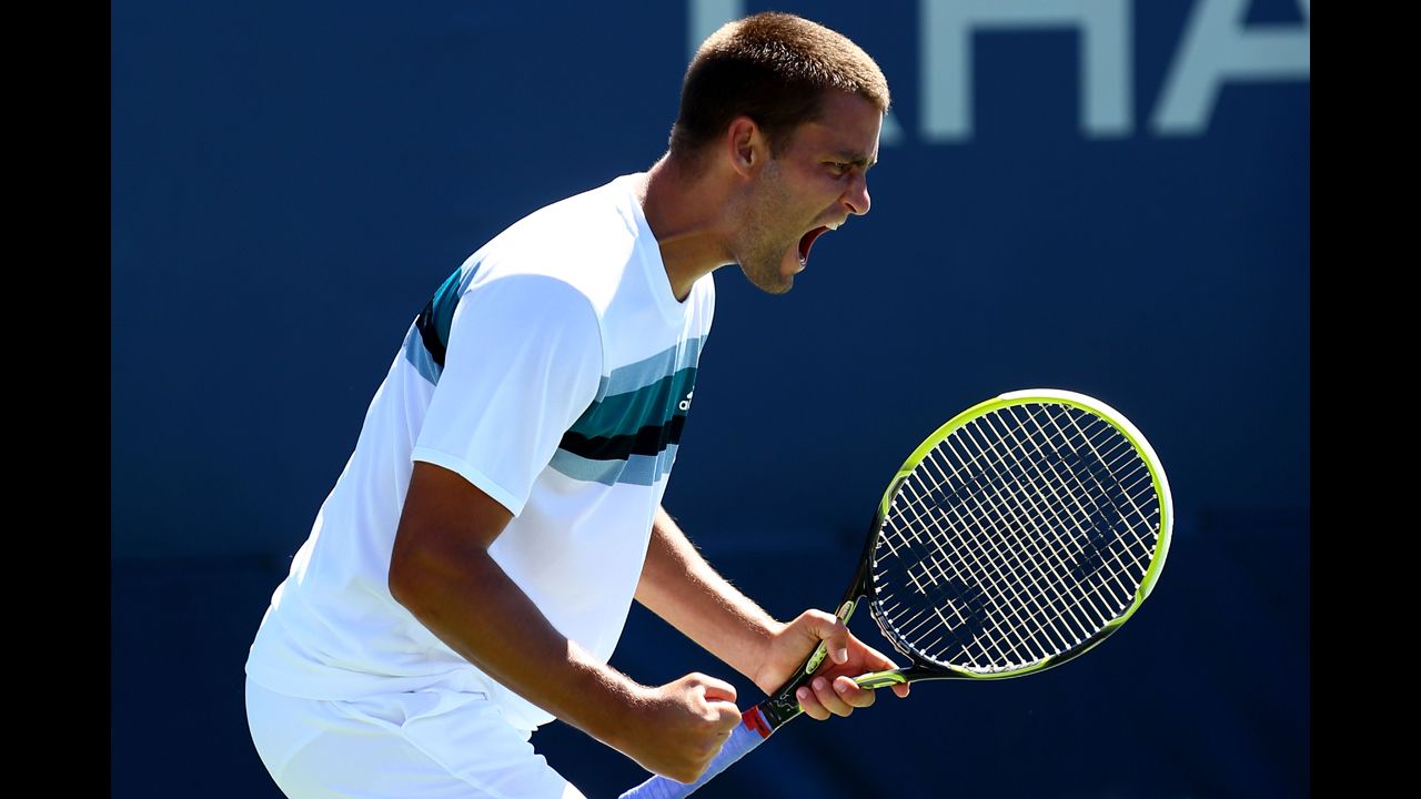 Mikhail Youzhny of Russia reacts during his match against Gilles Muller of Luxembourg.