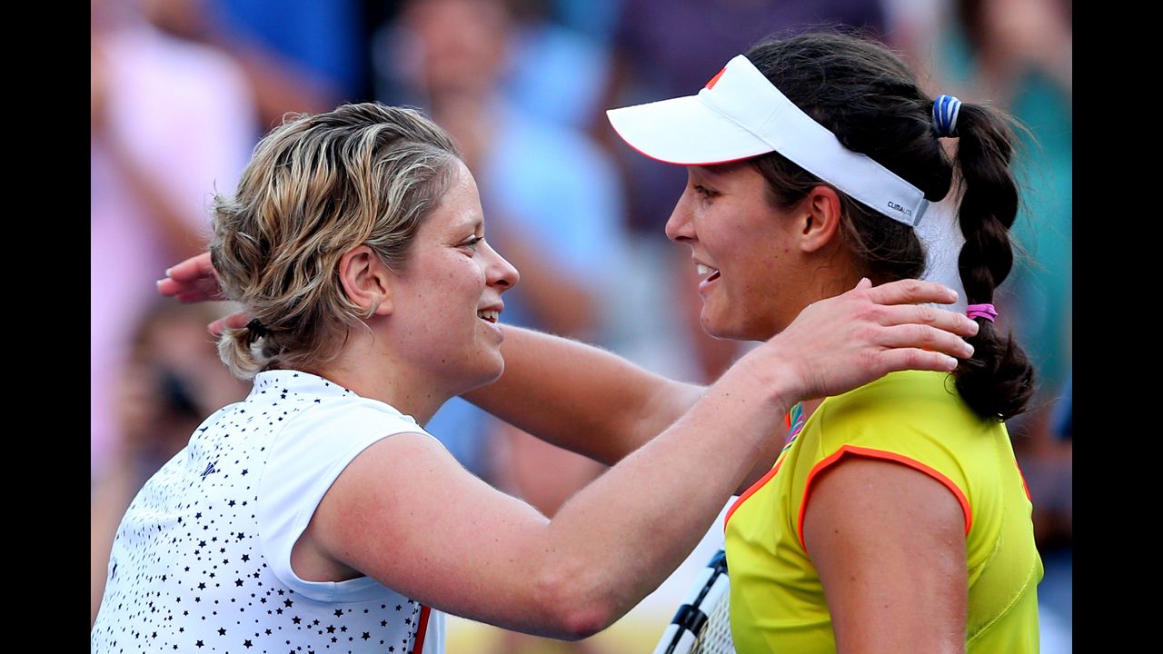Belgian Kim Clijsters, left, congratulates Britain's Laura Robson after their match.
