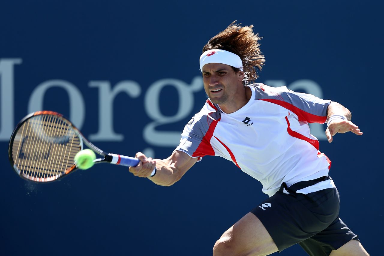 Spain's David Ferrer returns a shot against South African Kevin Anderson.