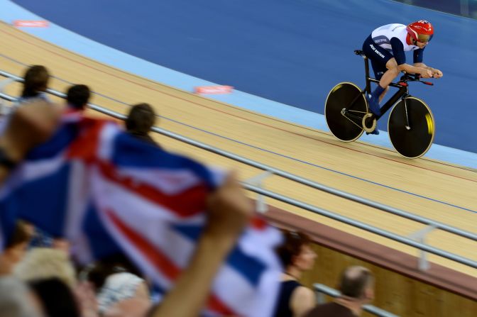 Mark Colbourne of Great Britain competes in the men's individual cycling event.