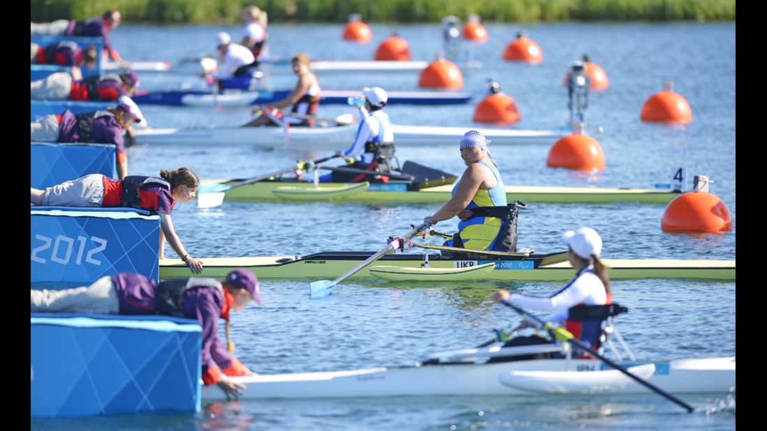 Ukraine's Alla Lysenko (second in row) prepares to take part in the women single sculls heat on Friday.