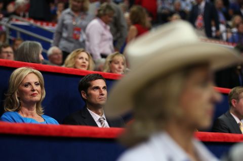Mitt Romney's wife, Ann, and son Josh sit in the VIP box.