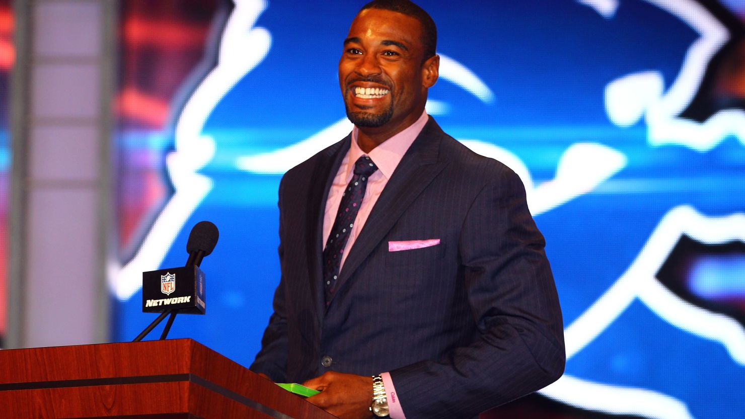"Madden NFL '13" cover player Calvin Johnson of the Detroit Lions announces a Lions' pick at the 2012 NFL Draft in New York.
