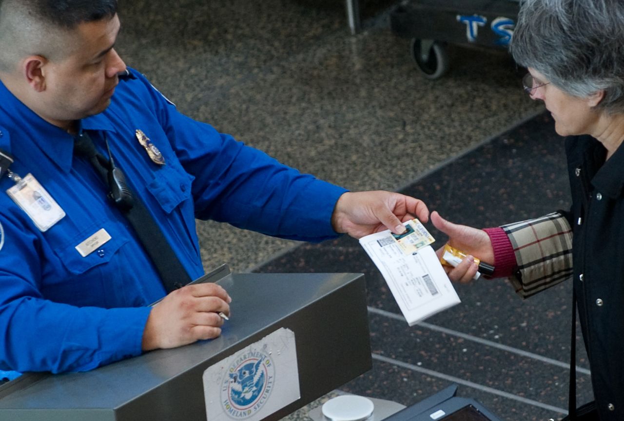Currently, TSA screeners examine each traveler's boarding pass and ID by hand. 
