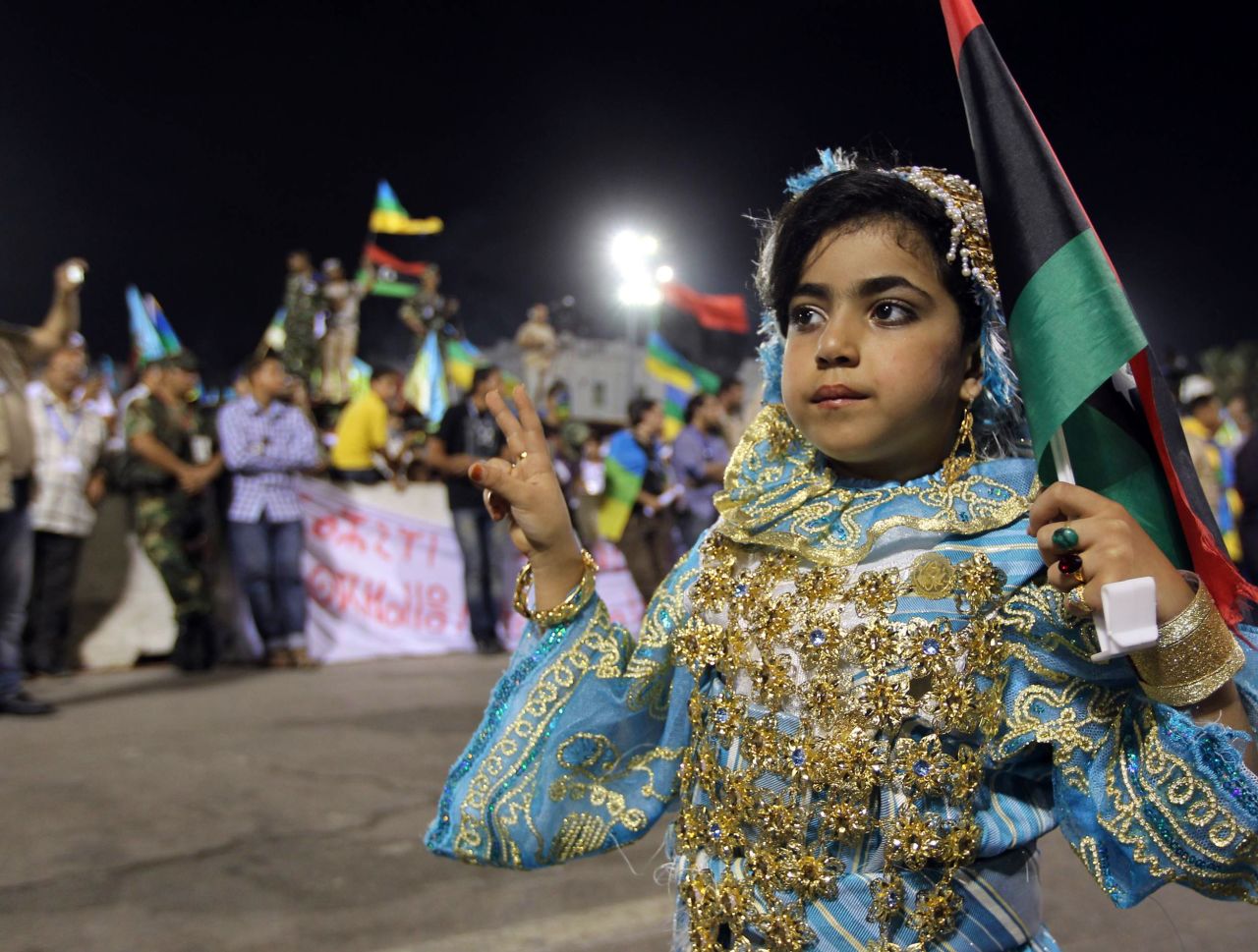 A Berber girl dressed in traditional attire at a Berber cultural festival in Tripoli. Public displays of Amazigh culture were forbidden under the Gadhafi regime.