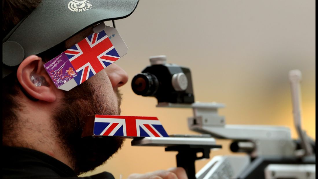 Great Britain's Ryan Cockbill lines up his shot at the shooting range during the P2-10-meter air pistol SH1 final.