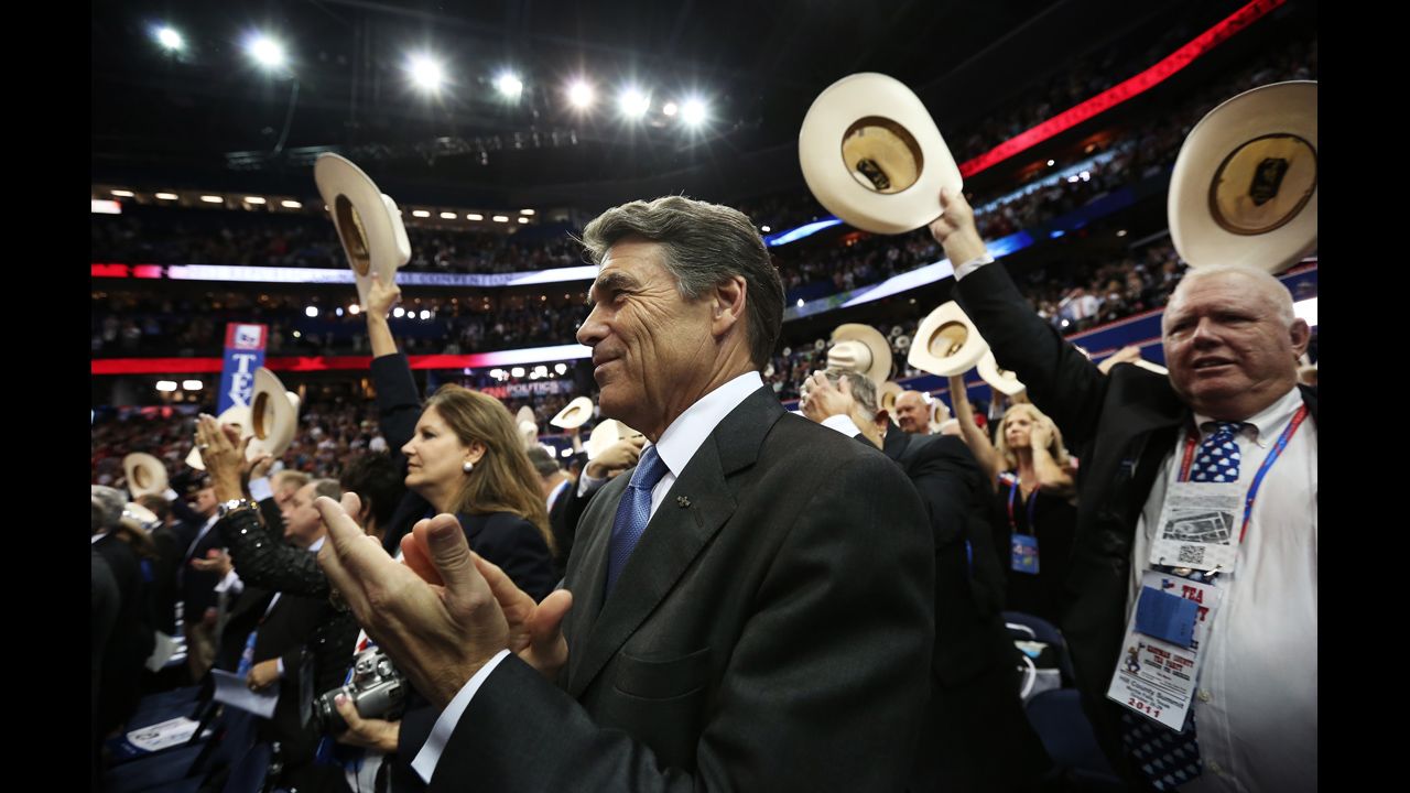 Texas Gov. Rick Perry applauds during the final day of the convention.