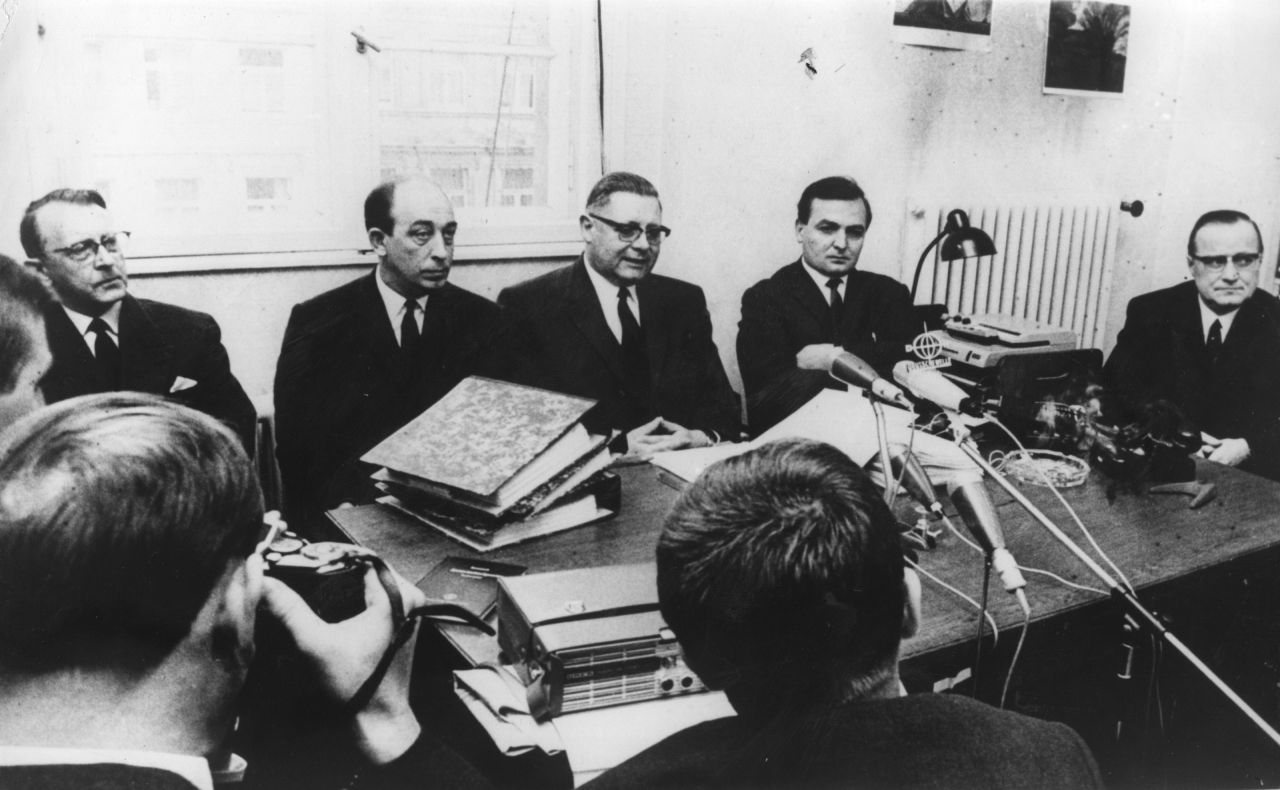 Members of the German public prosecutor's office announce on March 15, 1967, that pharmaceutical company executives will go on trial over the Thalidomide case.