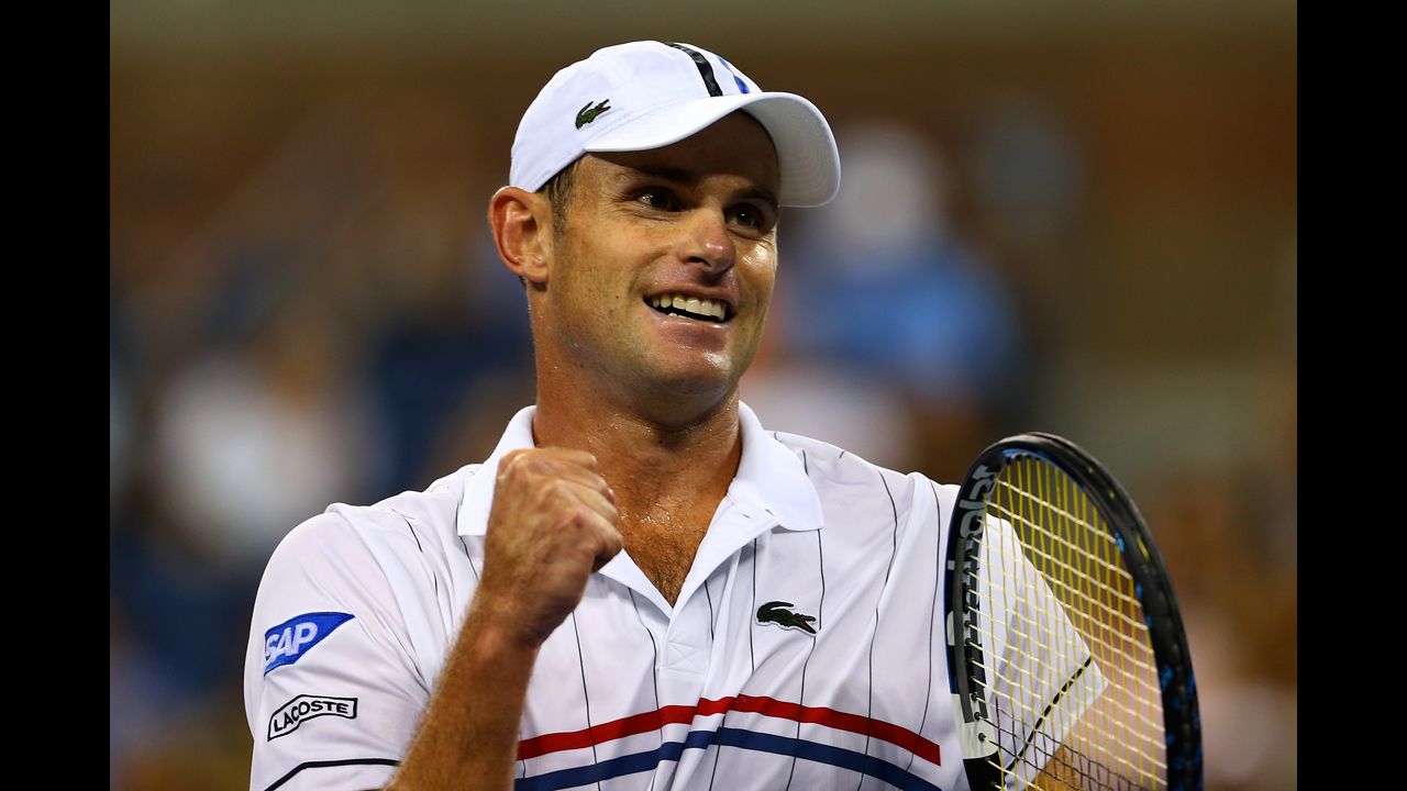 Roddick celebrates a point during his men's singles second round match Tomic. Roddick, 30, who has announced he will retire after the U.S. Open, won in three sets.