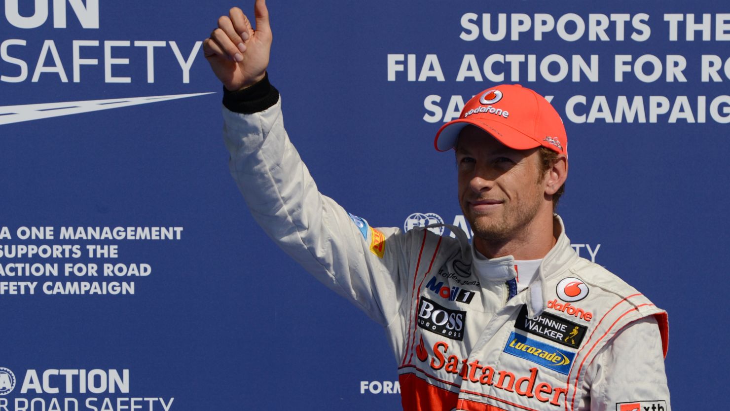 It's thumbs up for Jenson Button after claiming pole for the Belgian Grand Prix for McLaren.