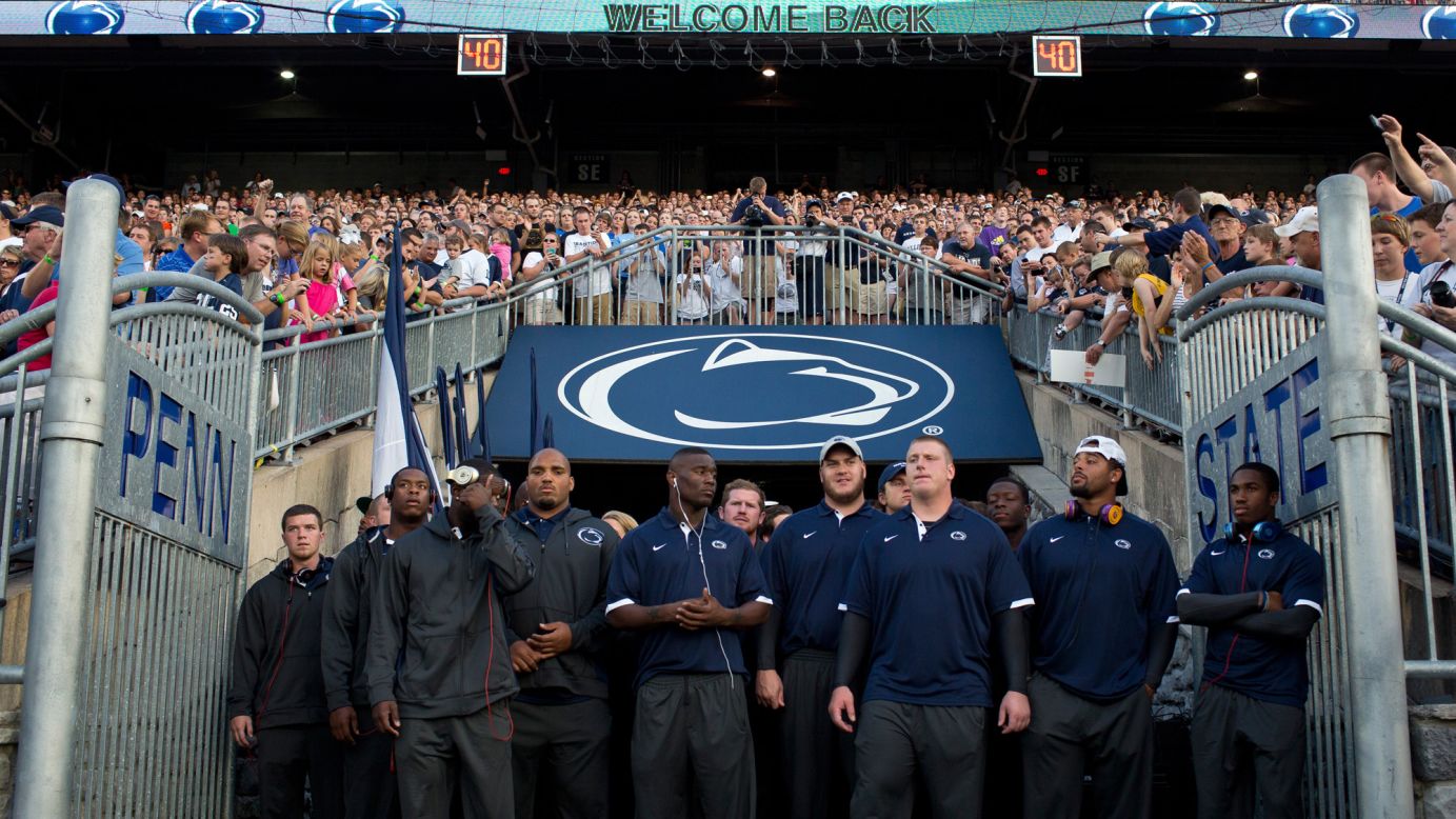The Penn State football team prepares to take the field at the university's Football Eve pep rally Friday at Beaver Stadium.