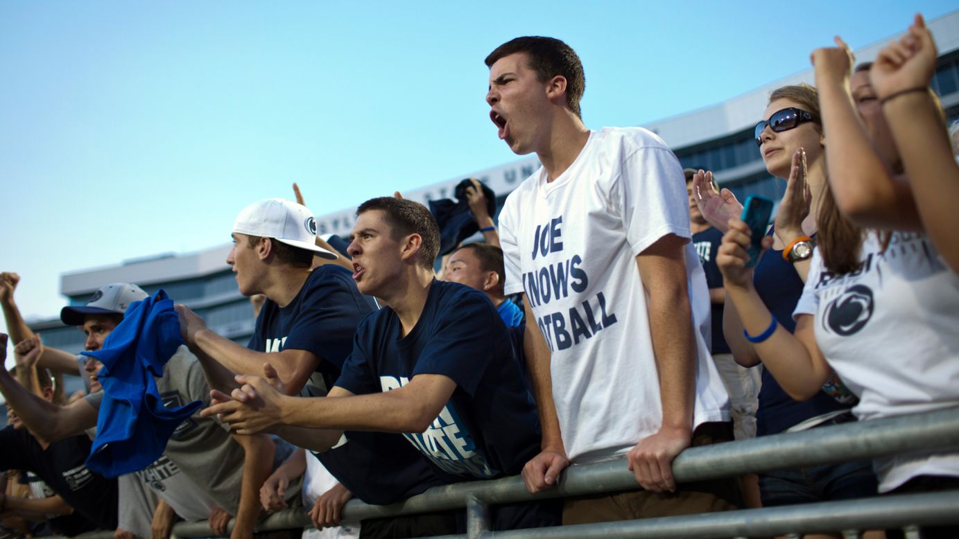 Penn State football fans cheer during the Football Eve pep rally at Beaver Stadium.