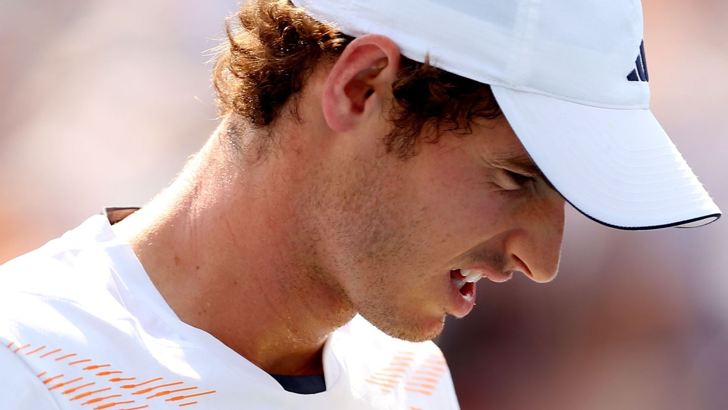 A tired Andy Murray reacts after losing a point in his match against Feliciano Lopez. 